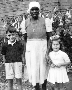 1945. Tom, sister Vera and nanny
Aya, at home in Nairobi, Kenya